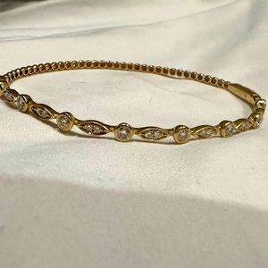 14k yellow gold 3/4 ct tennis bracelet with clasp.